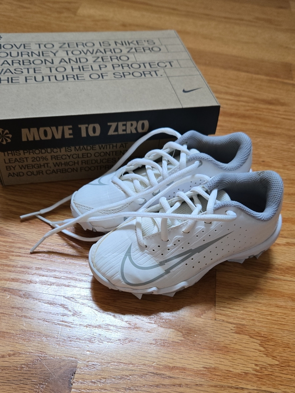 Nike Kids White & Gray Cleats with Silver Swoosh